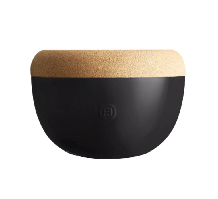 Deep black ceramic storage bowl with light cork lid, minimalist kitchenware design