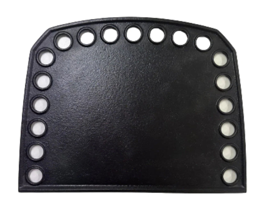 Black cast iron reversible hotplate with circular vent holes for barbecue grills